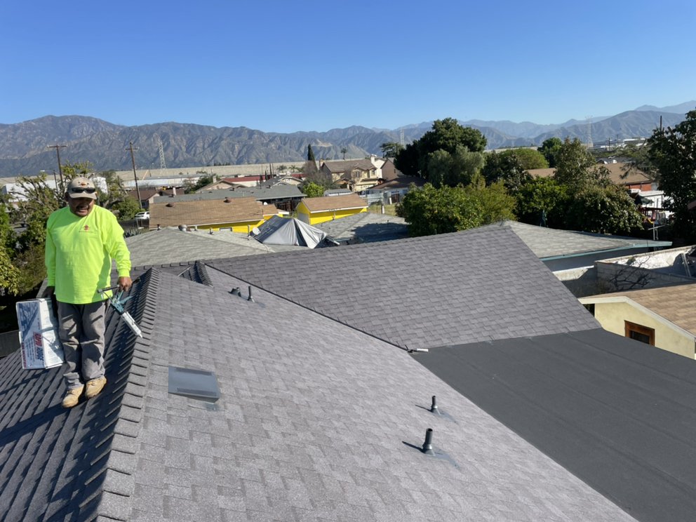 Slide of New Village Roofing