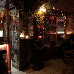 Tiki Taki Bar - Tiki ephemera and pac man machine