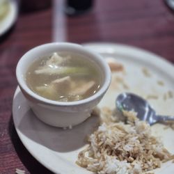 Soup with sides of rice.