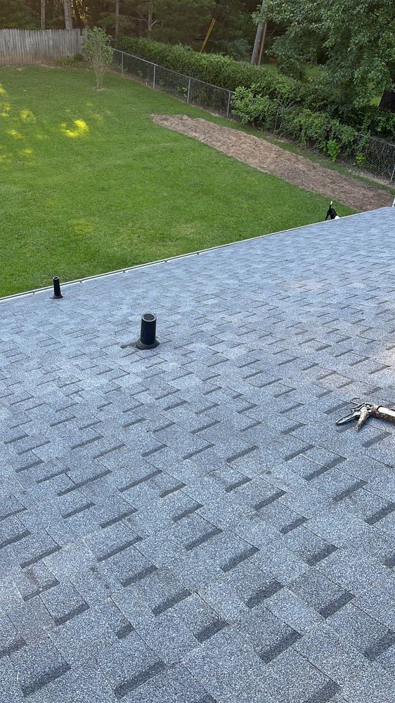 Slide of Cox Roofing