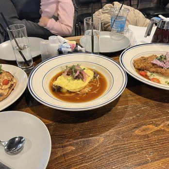 Lucille's - Croissant French Toast Oxtail Omelette Catfish & Grits - New American Near Me - Houston, Texas Lucille's - Croissant French Toast Oxtail Omelette Catfish & Grits - New American Near Me - Houston, Texas
