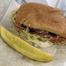 Antipasto sandwich and pickle Antipasto sandwich and pickle