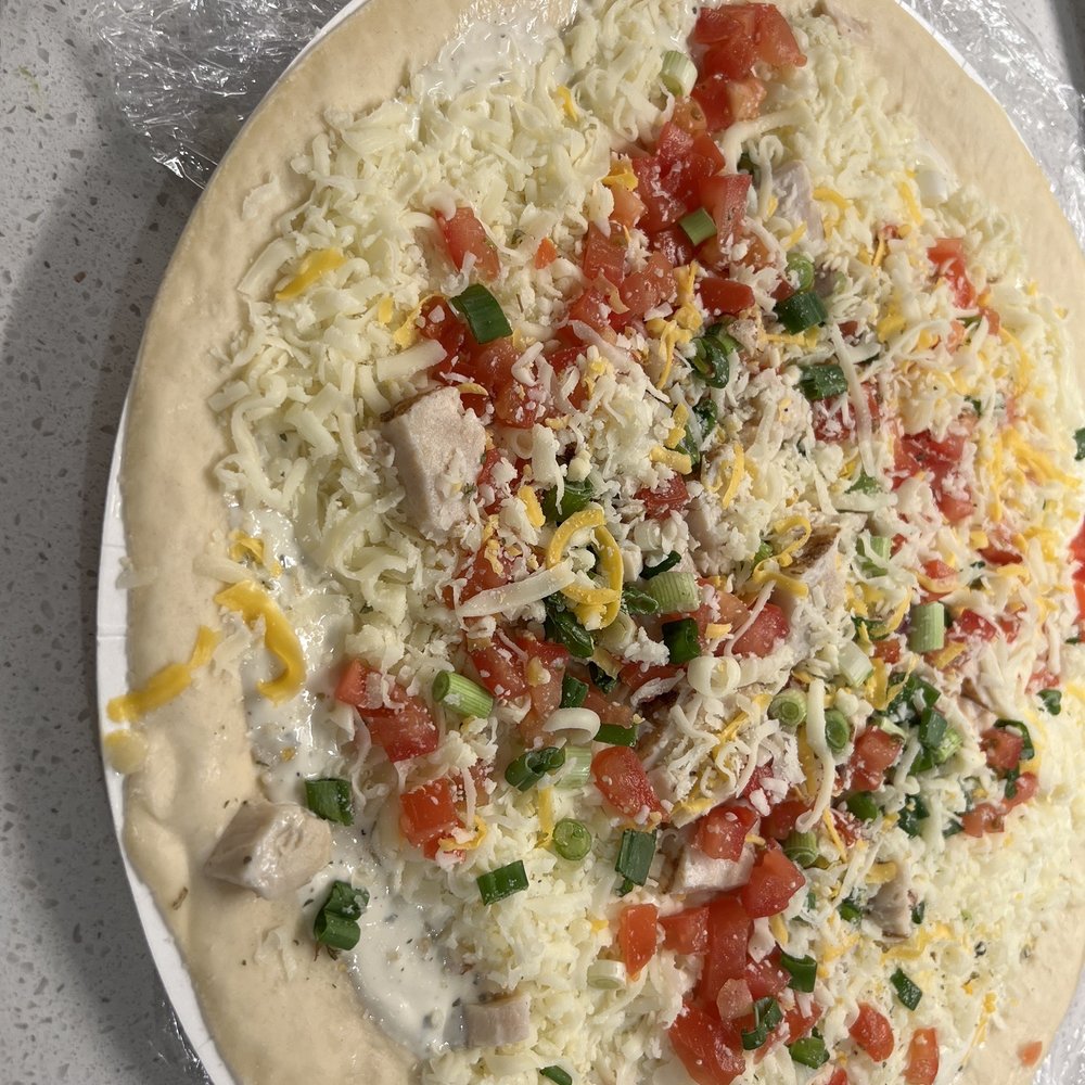 Papa Murphy's - a pizza covered in cheese and vegetables - Pizza Near Me - Folsom, California