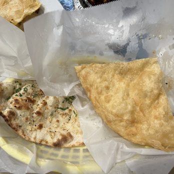 Himalayan Cafe - One garlic naan and one roti - Himalayan/Nepalese Near Me - Pasadena, California