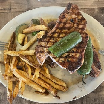 Beefmaster Steakhouse - Pork chops with fries, zucchini and jalapeños - Steakhouses Near Me - Weatherford, Texas