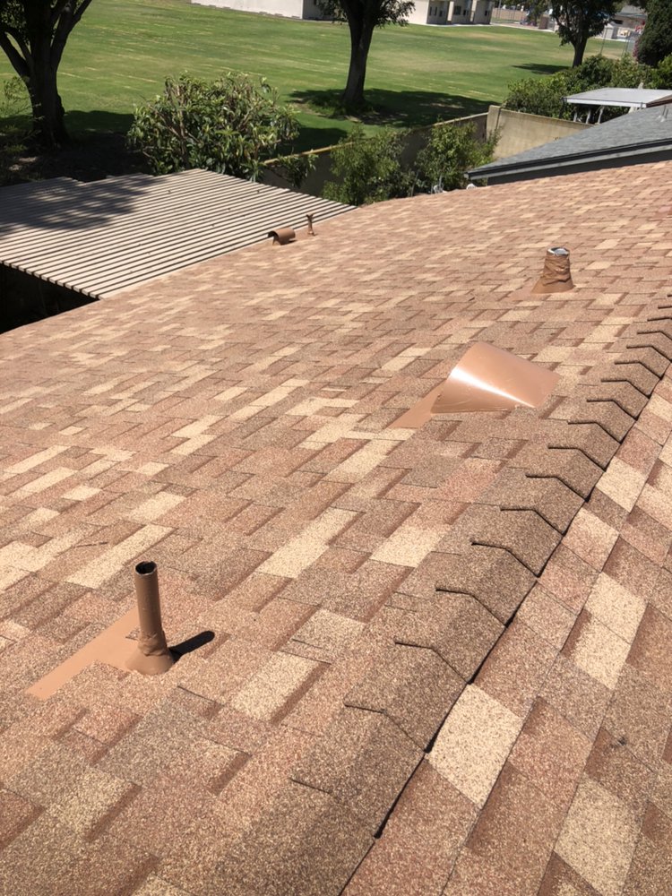 Slide of Frank Delgado Roofing