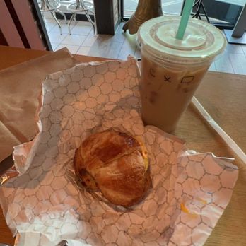 Hi-Fi Coffee Bar - Iced coffee and turkey sausage, egg, and cheese on a croissant - Cafes Near Me - Myrtle Beach, South Carolina Hi-Fi Coffee Bar - Iced coffee and turkey sausage, egg, and cheese on a croissant - Cafes Near Me - Myrtle Beach, South Carolina