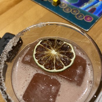 Snakes & Lattes Annex - Strawberry margarita on the rocks. It's sour, doesn't taste strawberry, but I liked it. This drink had a nice little kick! - Bars Near Me - Toronto, Ontario