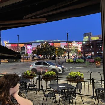 Flannery's Pub - a woman talking on her cell phone - Sports Bars Near Me - Cleveland, Ohio