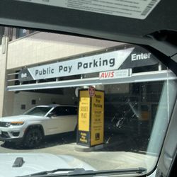 Avis Car & Truck Rental - The Avis return drop off area, in a parking garage.