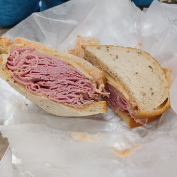 Attman's Delicatessen - Hot corned beef with Swiss cheese in rye, $13.68. - Delis Near Me - Baltimore, Maryland Attman's Delicatessen - Hot corned beef with Swiss cheese in rye, $13.68. - Delis Near Me - Baltimore, Maryland