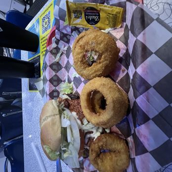 Mel's Diner - Buddy Holly Chili Cheeseburger with a side of onion rings - Diners Near Me - Pigeon Forge, Tennessee Mel's Diner - Buddy Holly Chili Cheeseburger with a side of onion rings - Diners Near Me - Pigeon Forge, Tennessee