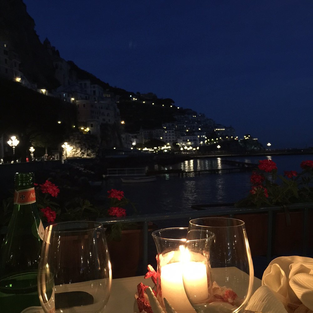 Lido Azzurro - The view across the bay from our table. - Italian Near Me - Amalfi, SA Lido Azzurro - The view across the bay from our table. - Italian Near Me - Amalfi, SA