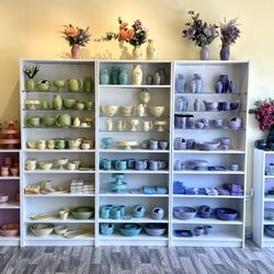 Glaze - Rainbow wall of handmade ceramics