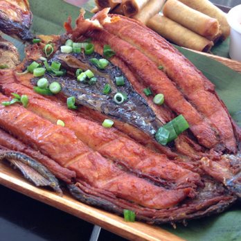 Lahi - Daing-fried marinated boneless milkfish topped with crispy garlic...no crispy garlic though. - Filipino Near Me - Elmhurst, New York Lahi - Daing-fried marinated boneless milkfish topped with crispy garlic...no crispy garlic though. - Filipino Near Me - Elmhurst, New York