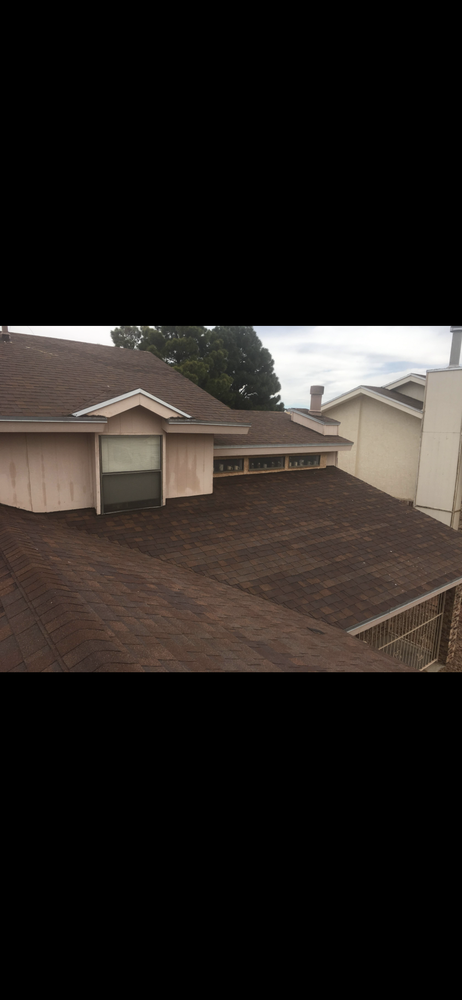 Slide of Mann & Sons Roofing