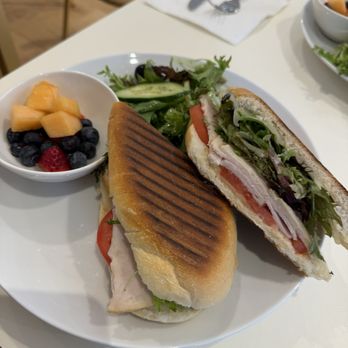 Cafe Cheri - Turkey tomatoes peso, on a freshly baked and heated baguette. And a tasty mini fruit salad - Coffee & Tea Near Me - Boca Raton, Florida