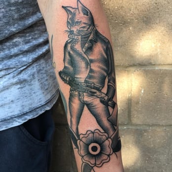 Infamous Ink - Leather Cat by @robertdoesthings - Tattoo Near Me - Pico Rivera, California Infamous Ink - Leather Cat by @robertdoesthings - Tattoo Near Me - Pico Rivera, California
