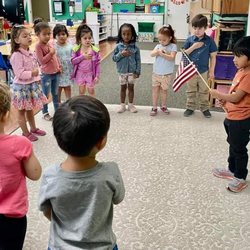Pledge of allegiance: each student gets a turn each day to hold the flag
