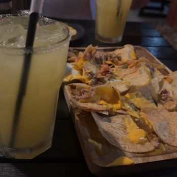 Woody’s Backyard Grill - Nachos mostly gone before drinks arrived - Beer, Wine & Spirits Near Me - Miami Springs, Florida Woody’s Backyard Grill - Nachos mostly gone before drinks arrived - Beer, Wine & Spirits Near Me - Miami Springs, Florida