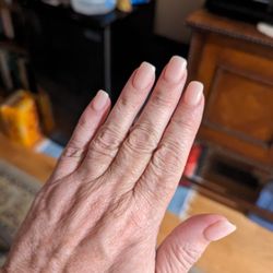 Nails by Tina - I asked for natural looking acrylic. We selected this perfect pink!