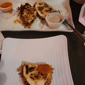 Flat Top Grill - Appetizer- $9.99 for four pieces of a chicken quesadilla not worth the price. Had we known, would have passed. - Asian Fusion Near Me - Chicago, Illinois