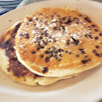 Sunset Grille & Raw Bar - BREAKFAST: Chocolate Chip Pancakes - Seafood Near Me - Marathon, Florida Sunset Grille & Raw Bar - BREAKFAST: Chocolate Chip Pancakes - Seafood Near Me - Marathon, Florida