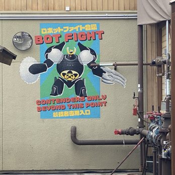 San Fransokyo Square - Bot fight poster (cast member alley) - Amusement Parks Near Me - Anaheim, California San Fransokyo Square - Bot fight poster (cast member alley) - Amusement Parks Near Me - Anaheim, California