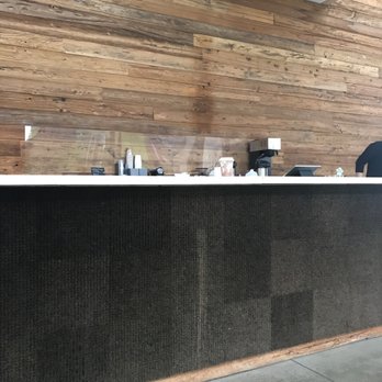 Café Omi - a counter with a black counter top - Cafes Near Me - Ghent, New York Café Omi - a counter with a black counter top - Cafes Near Me - Ghent, New York