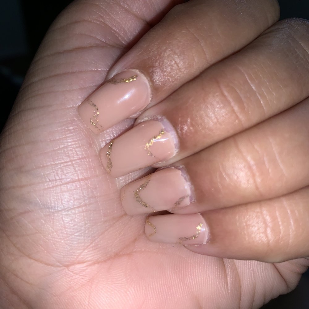 The acrylic has lifted in all four nails. The acrylic has lifted in all four nails.