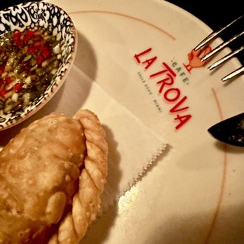 Cafe La Trova - Beef  Empanada....  The food here is sooooooooo goood - Cocktail Bars Near Me - Miami, Florida