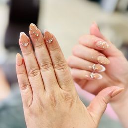Almond shape nails with dip powder and bling designs Almond shape nails with dip powder and bling designs
