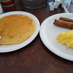 Light breakfast, one pancake, one egg, choice of breakfast meat. Just enough!