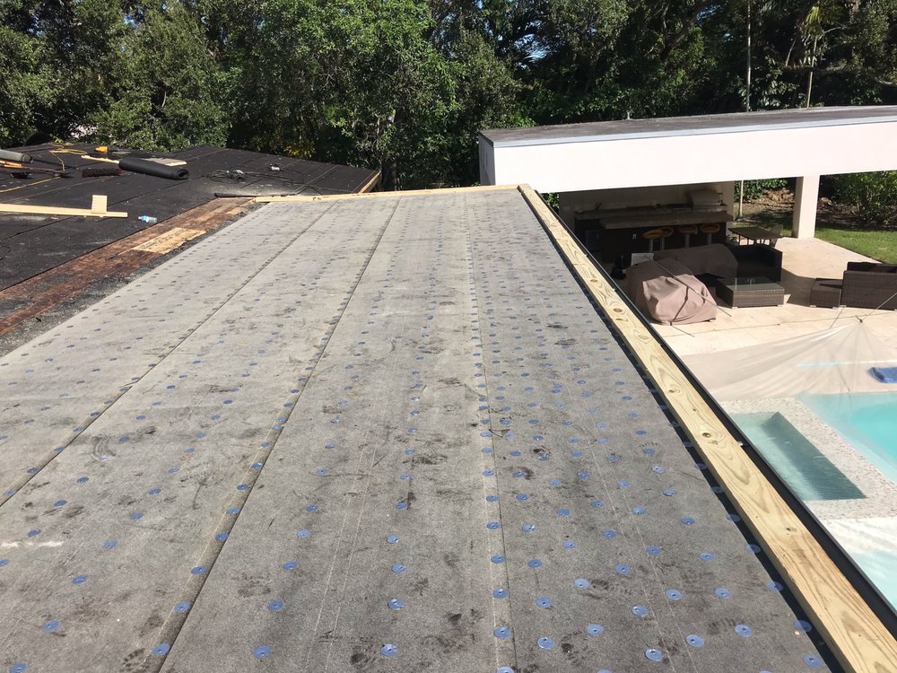 Slide of D-Tech Roofing