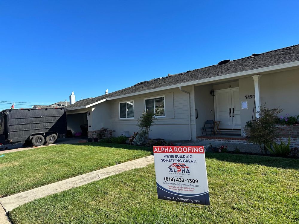 Slide of Alpha Roofing Group