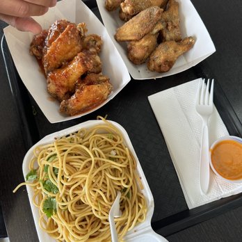 Shlap Muan Chicken Wings - Garlic noodles, Buffalo sauce, 16 wings 8 Cambodian dirt dry rub and 8 Sweet spicy garlic - Chicken Wings Near Me - Long Beach, California Shlap Muan Chicken Wings - Garlic noodles, Buffalo sauce, 16 wings 8 Cambodian dirt dry rub and 8 Sweet spicy garlic - Chicken Wings Near Me - Long Beach, California