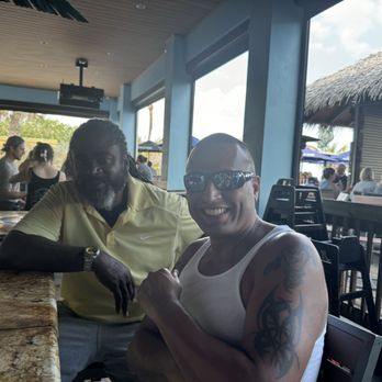 Coconuts On The Beach - Me and my friend Rob sitting at the outside bar - Bars Near Me - Cocoa Beach, Florida