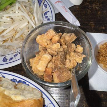 Kim Ky Noodle House - Toppings to add on the table include fried pork cracklings - Chinese Near Me - Westminster, California Kim Ky Noodle House - Toppings to add on the table include fried pork cracklings - Chinese Near Me - Westminster, California