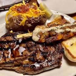 Ribeye* 12oz & Grilled Shrimp with a loaded bake potatoe.