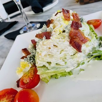 Del Frisco's Double Eagle Steakhouse - Blue Cheese Wedge Salad - New American Near Me - Plano, Texas Del Frisco's Double Eagle Steakhouse - Blue Cheese Wedge Salad - New American Near Me - Plano, Texas