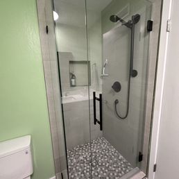 New frameless glass shower enclosure
