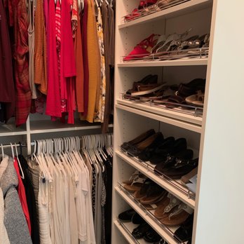 Lakeview Closets - Floor to ceiling tilted show rack holds lots to keep closet organized! - Building Supplies Near Me