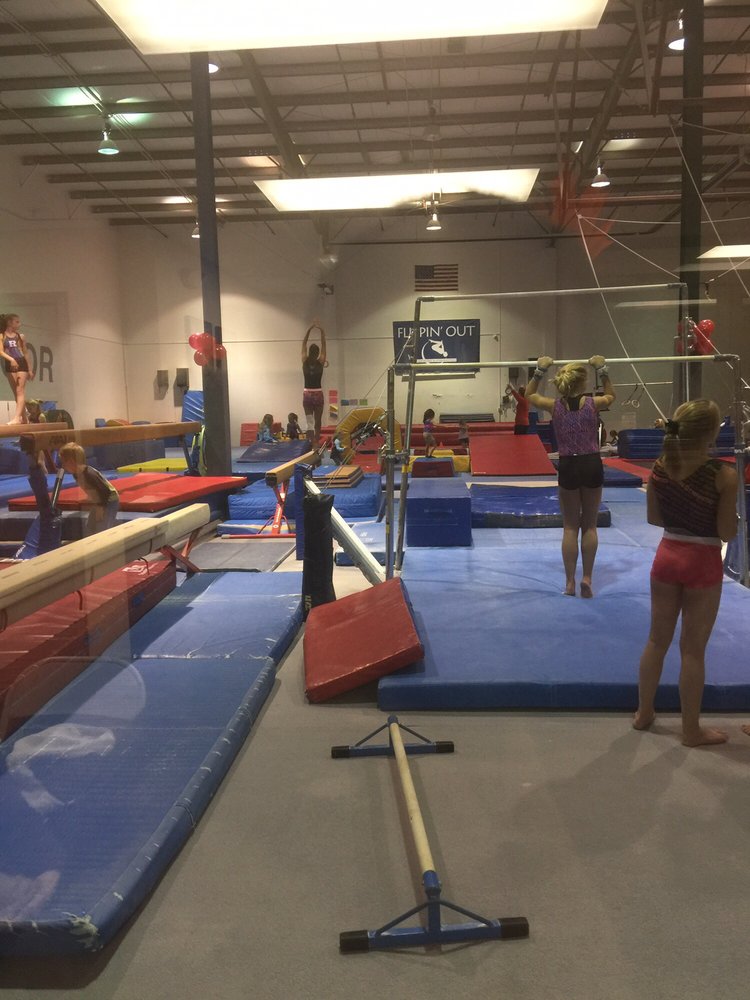 Flippin’ Out Tumbling And Gymnastics Logo