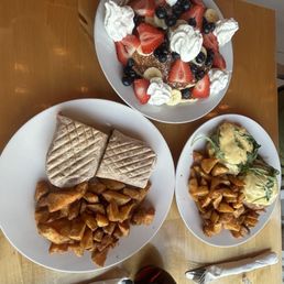 Pancakes, Eggs Benedict with home fries, and a Breakfast Burrito with home fries. Pancakes, Eggs Benedict with home fries, and a Breakfast Burrito with home fries.