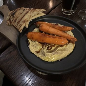 The Tavern - Hummus with maple glazed carrots, and pita bread - American Near Me - Salem, Massachusetts The Tavern - Hummus with maple glazed carrots, and pita bread - American Near Me - Salem, Massachusetts