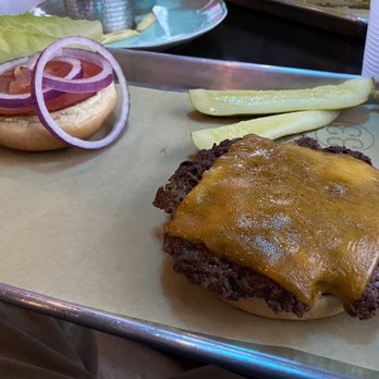 Table 33 - The $13 burger... Toasted brioche, Keener Farms grass-fed beef, cheddar, aioli, housemade ketchup, lettuce, tomato, red onion, pickle - Breakfast & Brunch Near Me - Dayton, Ohio