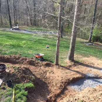 Creative Curves - They began with our giant hill - Landscaping Near Me - Clarksville, Tennessee
