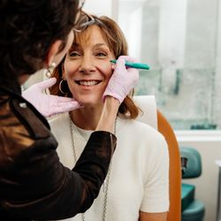 Eugenie Brunner, MD, FACS - Dr. Brunner with a patient
