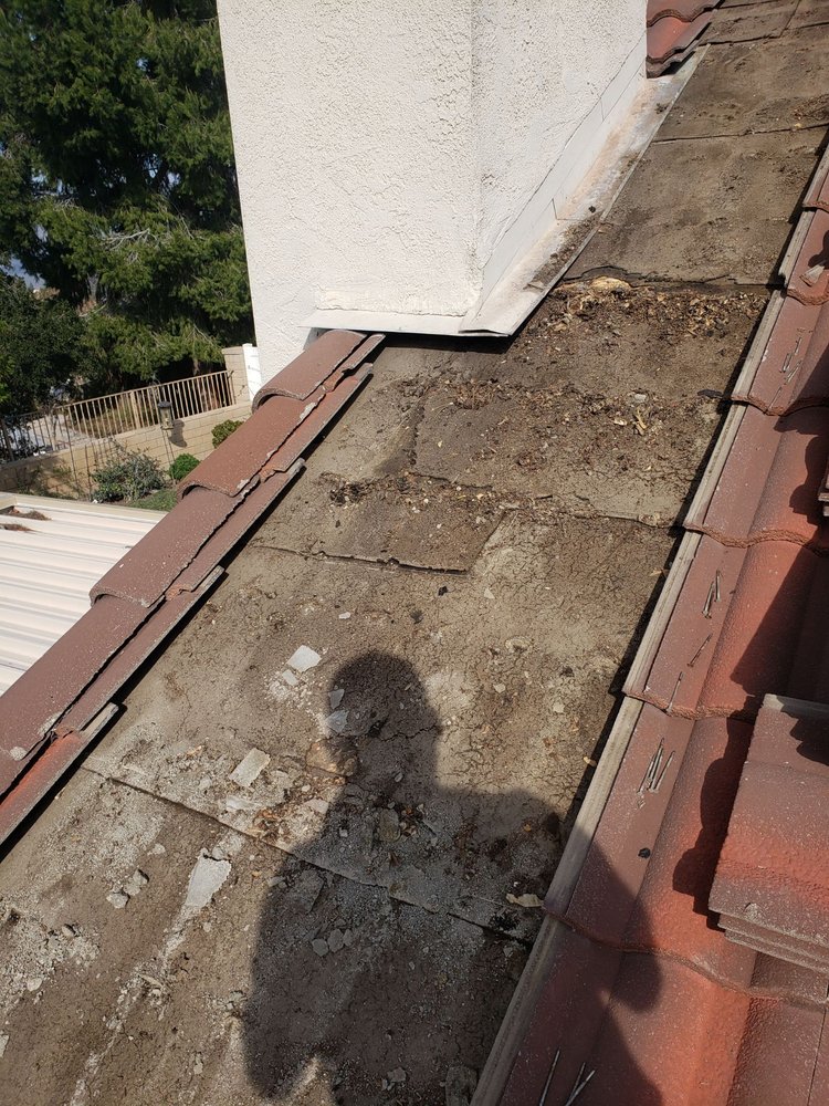 Slide of Art Roofing Plus