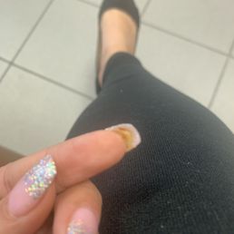 Superglued FOOD to my finger. Also glued my real nail to my skin to stop hair catching... no.
